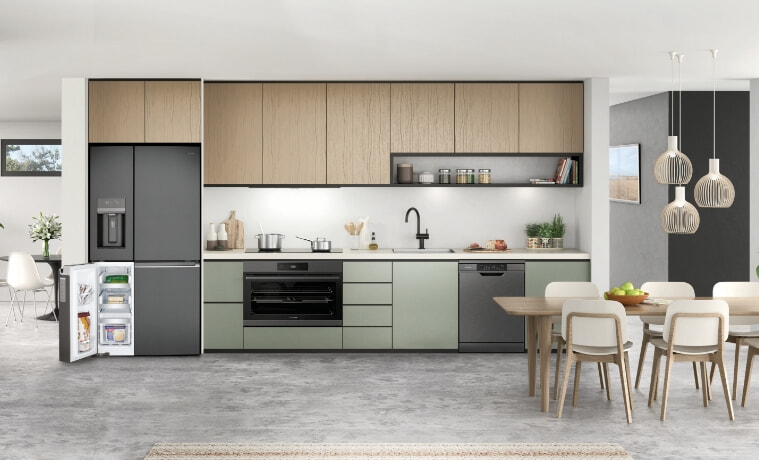A modern kitchen featuring a Westinghouse fridge, oven and dishwasher.
