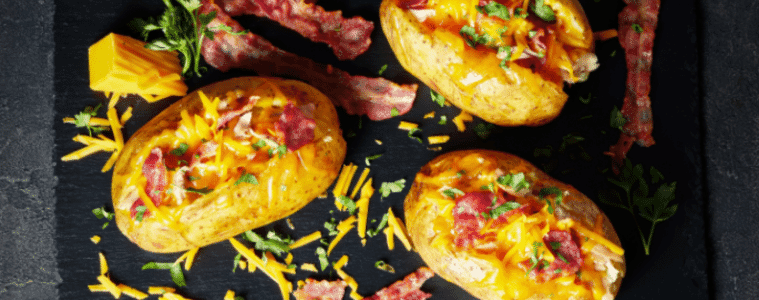 Close up image of cooked jacket potatoes.