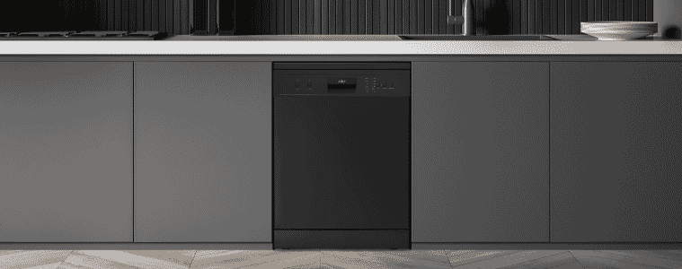 A Solt dishwasher fitted amongst black cabinetry.