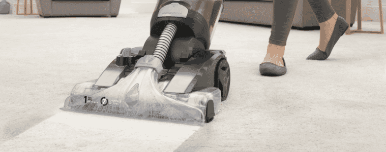 A carpet steam cleaner effectively removes dirt from a section of carpet, leaving a patch of lighter, cleaner carpet.