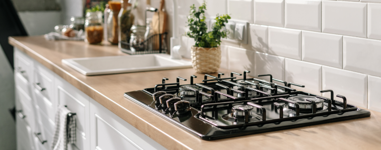 a new gas cooktop in a clean kitchen 