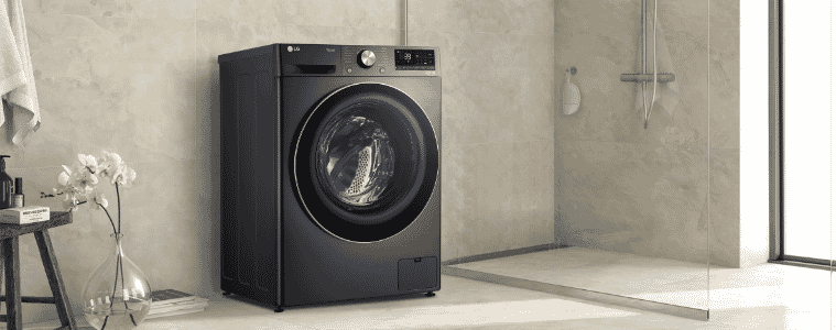 A black LG 9kg Front Load Washer in a laundry 