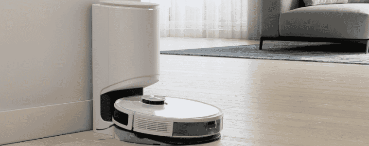 the Ecovacs DEEBOT N10 Plus Robotic Vacuum cleaning the carpet in the living room 