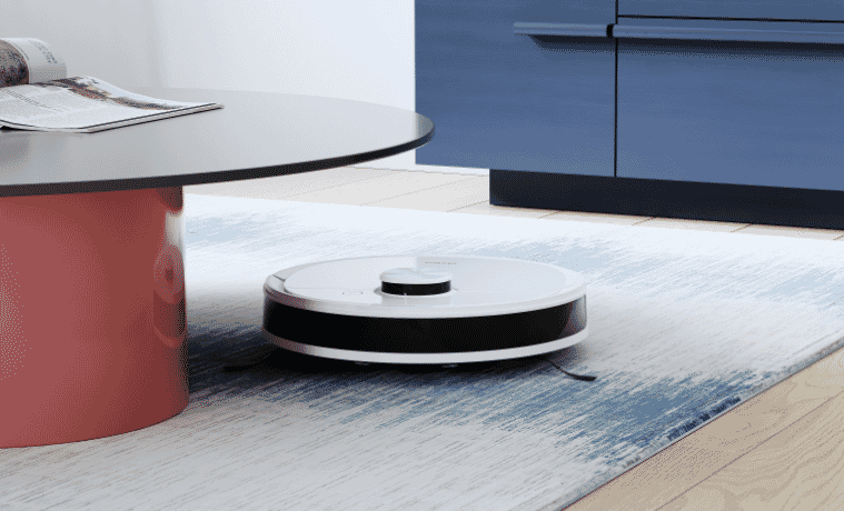 the Ecovacs DEEBOT N10 Plus Robotic Vacuum vacuuming the carpet in the living room