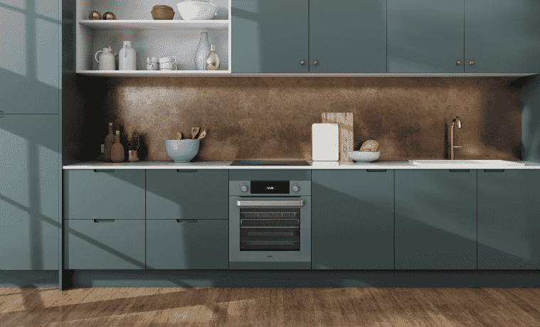 a mid grey Haier oven in a green kitchen 